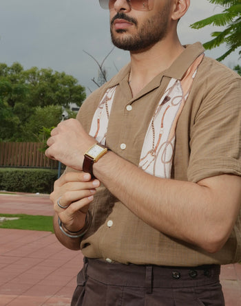 Man wearing a Twilly Scarf