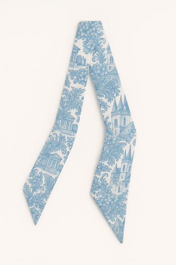 Blue and white patterned Twilly Scarf on a white background